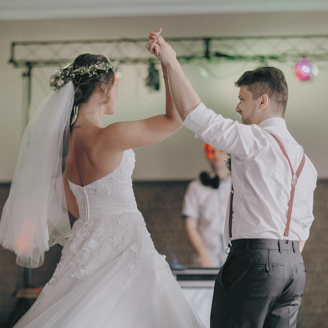 Man and women partner dancing at their wedding